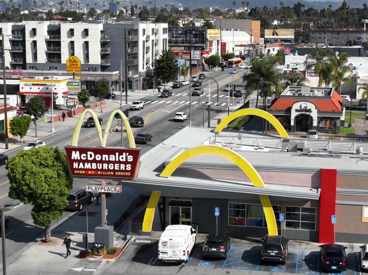 Los Angeles, CA - March 29: An aerial view of fast food restaurants on Crenshaw Blvd including Taco Bell, McDonald's, Yoshinoya, Subway, El Pollo Loco, Little Caesers, Panda Express,Taco Bell, and Smart & Final grocery store. Photo taken in south Los Angeles Friday, March 29, 2024. (Allen J. Schaben / Los Angeles Times)