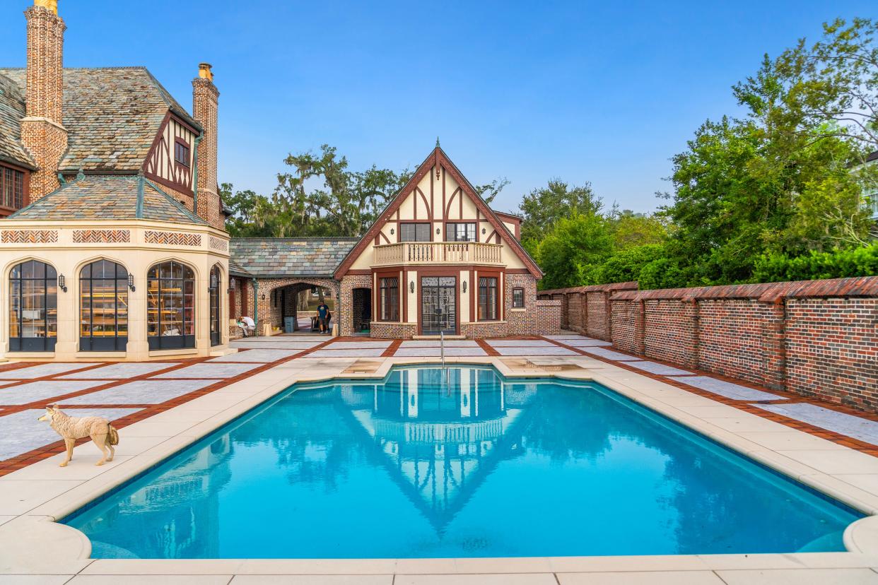 A new saltwater pool occupies the beautifully landscaped backyard. Other highlights of 3730 Richmond St. include a six-bay garage, guest home and a carriage house.