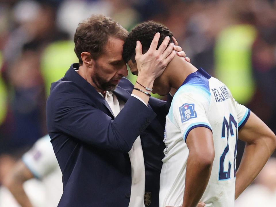 Gareth Southgate consoles Jude Bellingham after England’s World Cup exit (The FA via Getty Images)