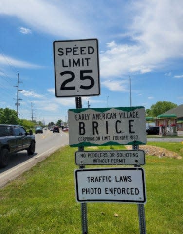 Welcome and speed warning signs at the north entrance to the Village of Brice along Brice road, just south of Gender Road