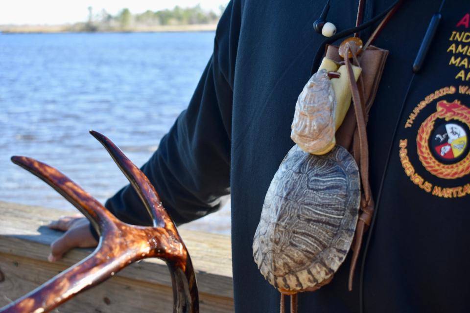 Lovell Pierce Moore, principal chief of the Cape Fear Band of Skarure and Woccon Indians, wears a turtle shell on a necklace, honoring the indigenous belief that the world was built on the back of a turtle.