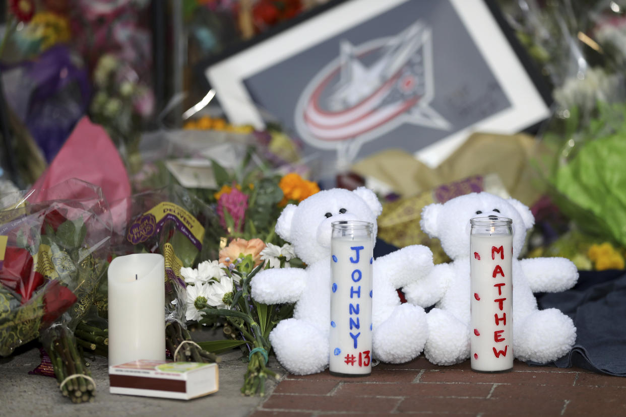 A memorial is set up by fans for Blue Jackets hockey player Johnny Gaudreau in Columbus, Ohio, Aug. 30, 2024. Gaudreau, along with his brother Matthew, was fatally struck by a motorist while riding his bicycle on Thursday. (AP Photo/Joe Maiorana)