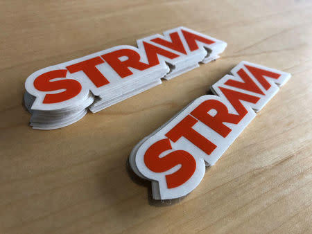 Stickers with the Strava Inc logo greet visitors at the fitness app company’s headquarters in San Francisco, California, U.S., March 7, 2018. Picture taken on March 7, 2018. REUTERS/David Ingram