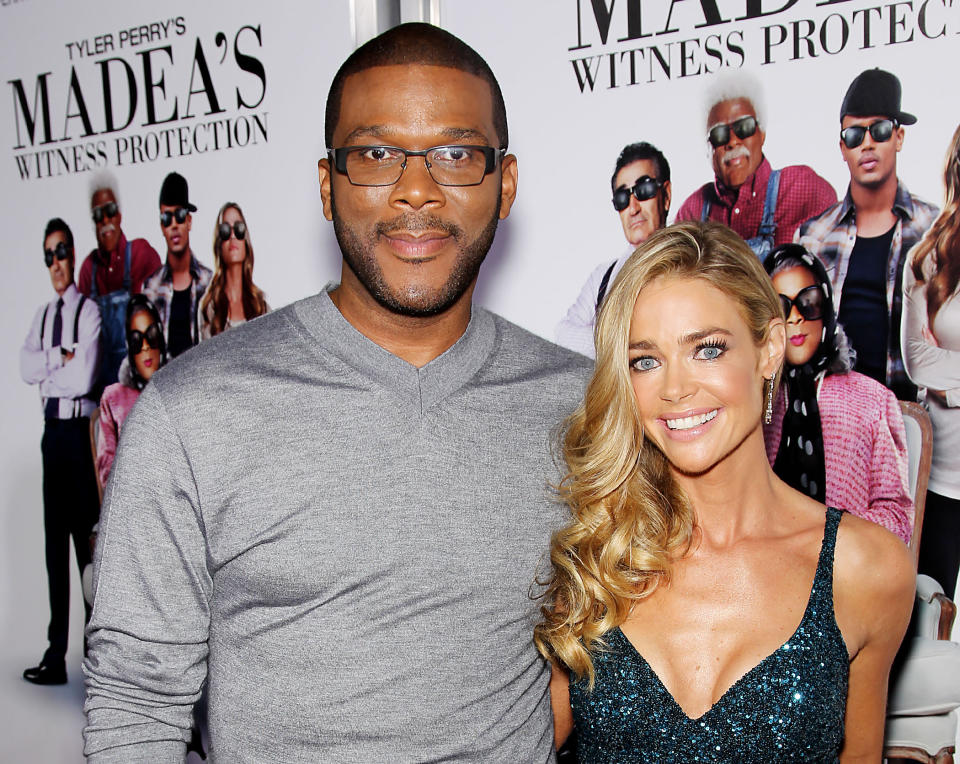 This June 25, 2012 photo released by Starpix shows actors Tyler Perry, left, and Denise Richards, at the premiere of the Lionsgate film, "Tyler Perry's: Madea's Witness Protection," at the AMC Lincoln Square Theater in New York. The film, starring Perry, Richards, Romeo, and Eugene Levy, opens nationwide on June 29. (AP Photo/Starpix, Marion Curtis)