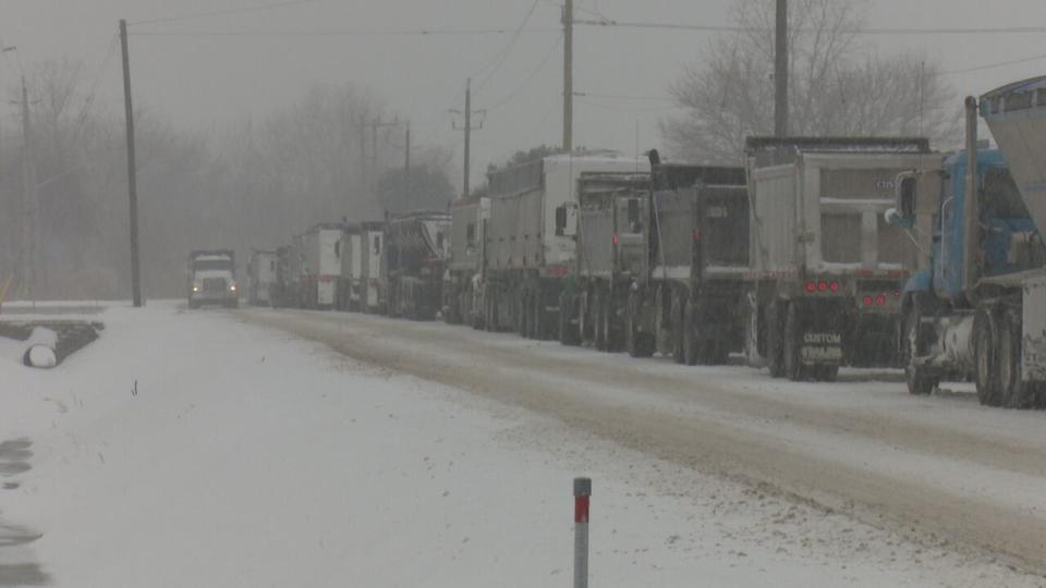 A long line of trucks waiting for a load of salt at the Ojibway Mine in Windsor on Friday.