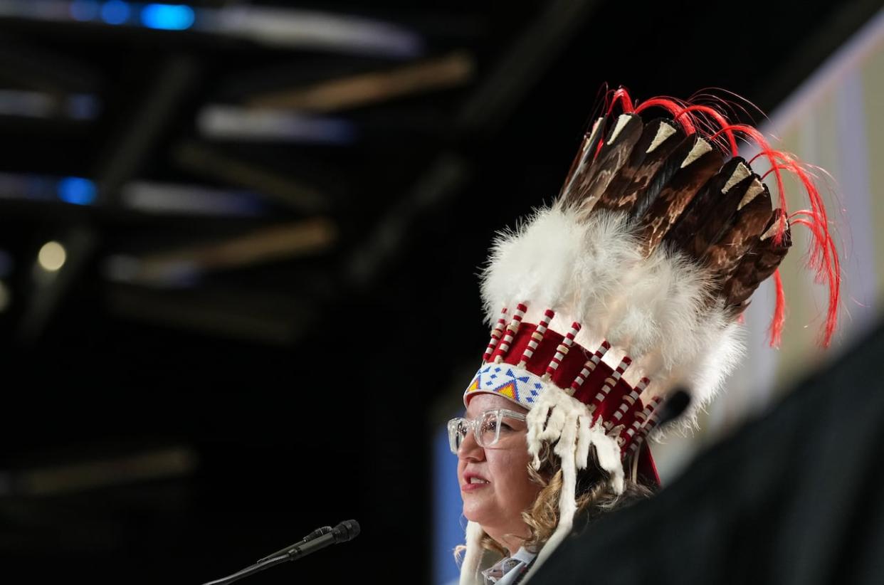 National Chief Cindy Woodhouse Nepinak gives her opening address at the Assembly of First Nations annual general assembly in Montreal on Tuesday.  (Christinne Muschi/The Canadian Press - image credit)