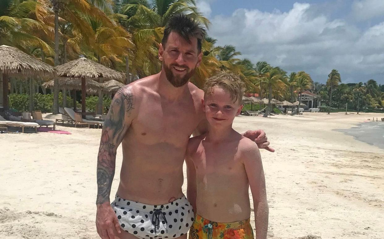 Anna O'Neill, from Canterbury, filmed her son Mackenzie playing football with Barcelona and Argentina legend Lionel Messi and his son, Thiago - PA