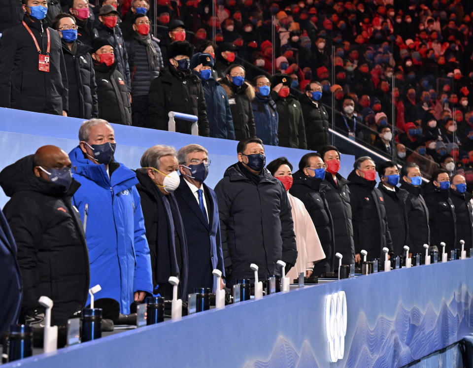 Chinese President Xi Jinping, center, attends the opening ceremony of the 2022 Winter Olympics, Friday, Feb. 4, 2022, in Beijing. (Yue Yuewei/Pool Photo via AP)