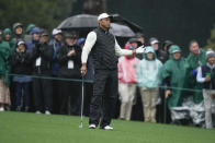 Tiger Woods reacts to his shot on the 15th hole during the weather delayed second round of the Masters golf tournament at Augusta National Golf Club on Saturday, April 8, 2023, in Augusta, Ga. (AP Photo/Matt Slocum)
