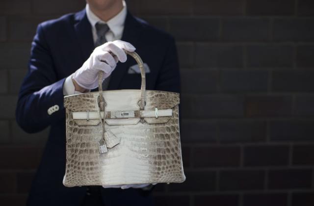 Pink crocodile skin handbag becomes world's most expensive at £150k HK  auction