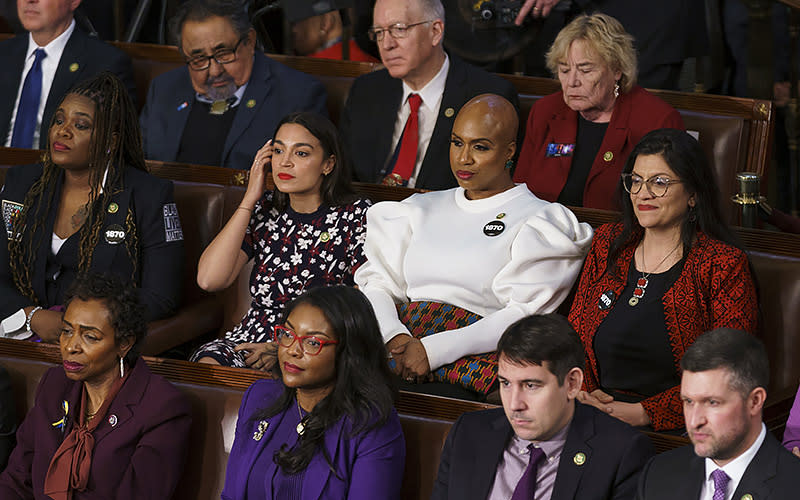 Reps. Cori Bush (D-Mo.), Alexandria Ocasio-Cortez (D-N.Y.), Ayanna Pressley (D-Mass.) and Rashida Tlaib (D-Mich.) are seen as President Biden gives his State of the Union address. <em>Greg Nash</em>