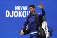 Novak Djokovic, of Serbia, walks onto the court to play against Daniil Medvedev, of Russia, in the men's singles final of the US Open tennis championships, Sunday, Sept. 12, 2021, in New York. (AP Photo/John Minchillo)