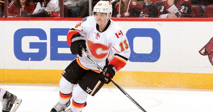 GLENDALE, AZ - DECEMBER 08: Johnny Gaudreau #13 of the Calgary Flames skates with the puck against the Arizona Coyotes at Gila River Arena on December 8, 2016 in Glendale, Arizona. (Photo by Norm Hall/NHLI via Getty Images)