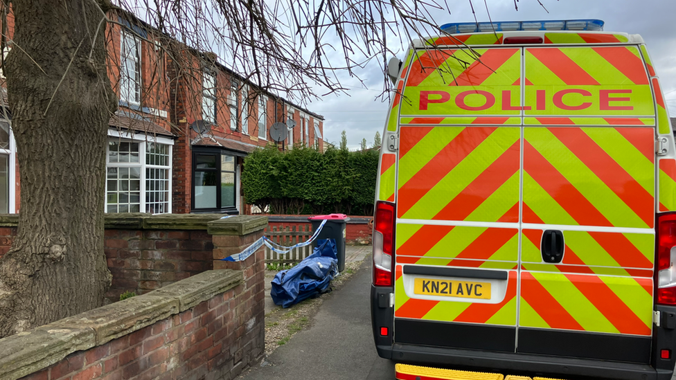 Police van outside a property in Worsley Road, Eccles
