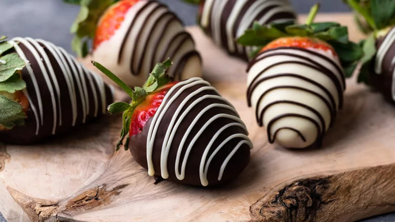 Strawberries coated in dark and white chocolate