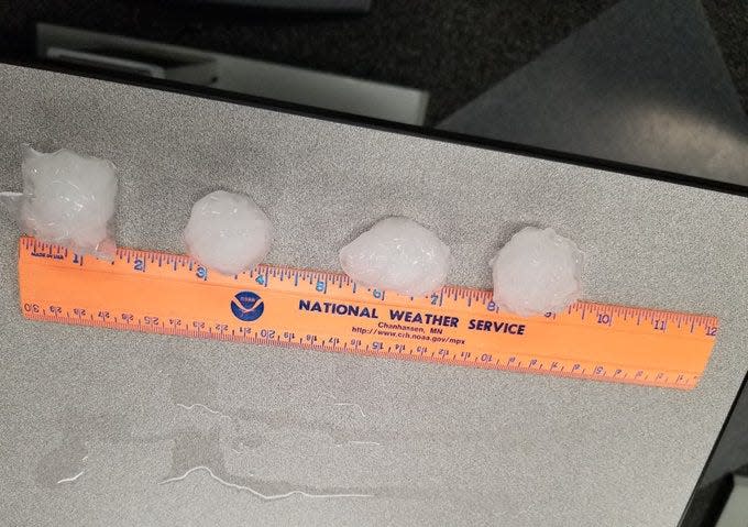 Hail, some of it 2 inches in diameter, fell at the National Weather Service office in Sullivan, Wisconsin, on Monday, according to a Tweet from the office.