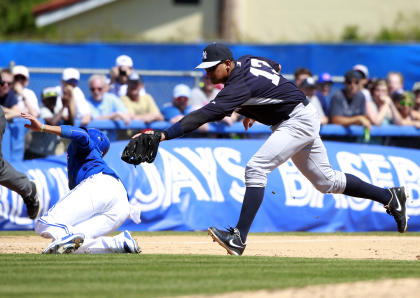 Alex Rodriguez (13) attempts to tag out Toronto Blue Jays second baseman Ryan Goins (17). (USAT)