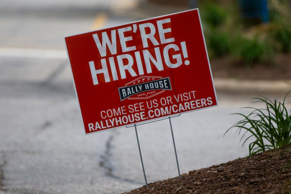 A hiring sign is displayed Monday, June 13, 2022, at Rally House in Mishawaka.