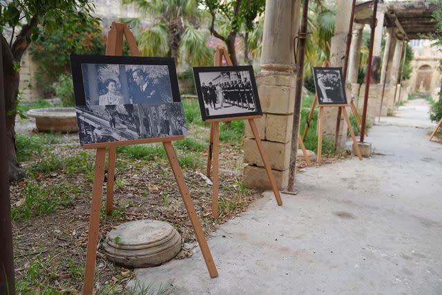 <p>Press Association via AP</p> Photos on display at Villa Guardamangia before Prince Edward and Sophie, the Duchess of Edinburgh's visit on Oct. 9, 2024.