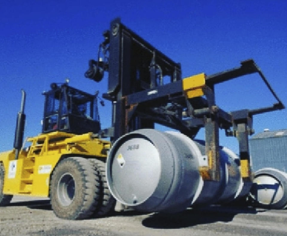 A file photo released by the Atomic Energy Organization of Iran on  November 6, 2019 shows a forklift carrying a cylinder containing uranium hexafluoride gas set to be injected for enrichment into centrifuges in Iran's Fordo nuclear facility near the city of Qom, Iran. / Credit: Atomic Energy Organization of Iran/AP