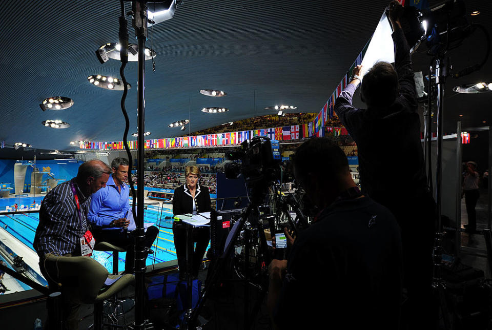 Clare getting ready to present with Mark Foster at the Aquatics Centre for the London 2012 Olympics.