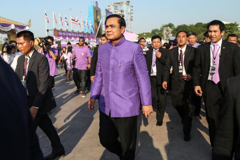 Thai junta chief and prime minister, Prayut Chan-O-Cha (c), pictured in Bangkok, on April 2, 2015