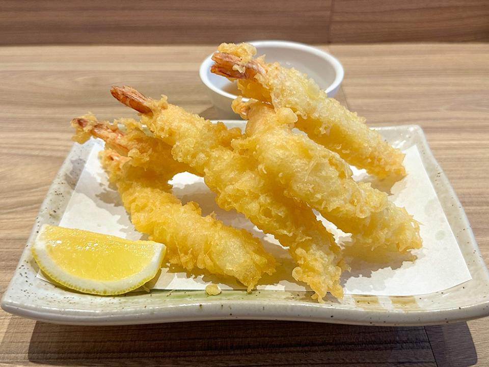 Tempura prawns are addictive with their light crispy batter.