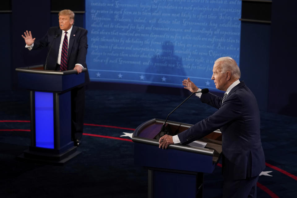 FILE - President Donald Trump and Democratic presidential candidate former Vice President Joe Biden exchange points during their first presidential debate at Case Western University and Cleveland Clinic, in Cleveland, Ohio, Sept. 29, 2020. (AP Photo/Morry Gash, Pool, File)