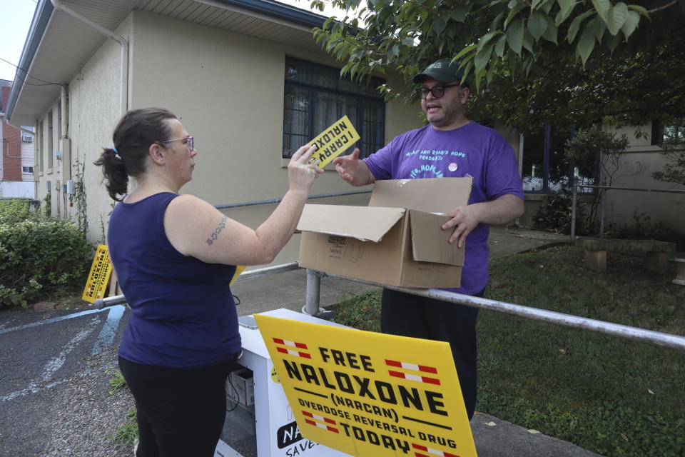 Nonprofit Solutions Oriented Addiction Response West Virginia co-founders Sarah Stone and Joe Solomon prepare materials for the first ever Appalachian Save a Life Day naloxone distribution event on Monday, September 11, 2023 at the Unitarian Universalist Congregation of Charleston in Charleston, W.Va. (AP Photo/Leah Willingham)