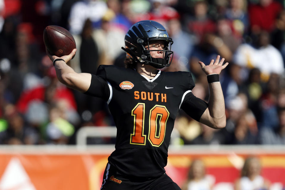 South quarterback Justin Herbert of Oregon (10) throws a pass during the first half of the Senior Bowl college football game Saturday, Jan. 25, 2020, in Mobile, Ala. (AP Photo/Butch Dill)