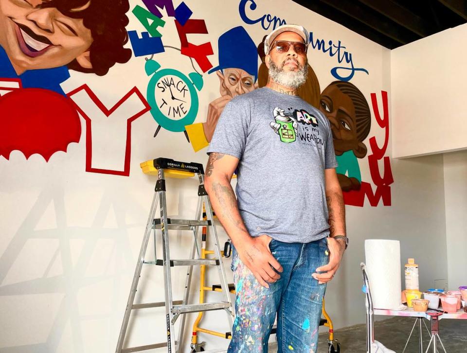 Cbabi [Kuh-bob-bi] Bayoc (pictured) was commissioned for a mural in the interior of Hot Box Cookies, a local St. Louis company that opens its ninth location in O’Fallon this week.