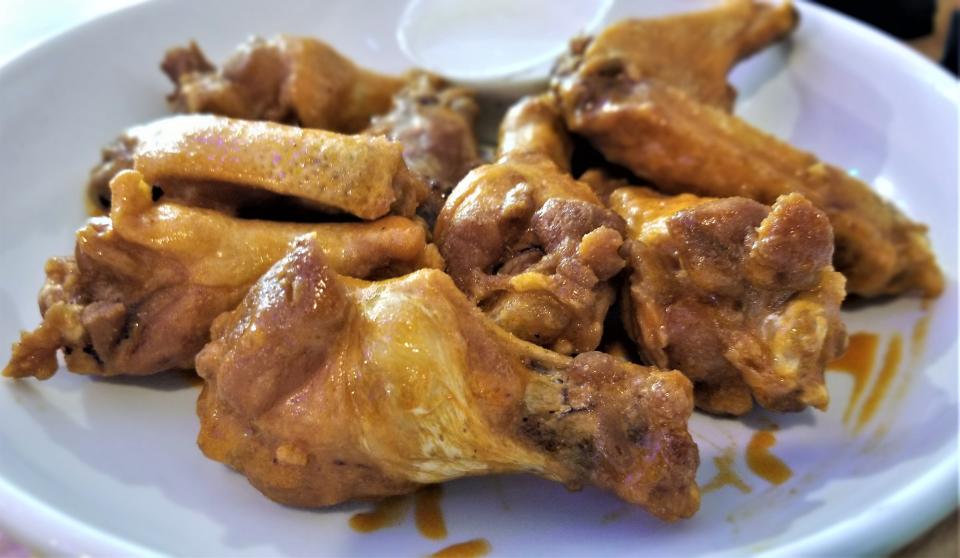 The chicken wings with "Cajun tequila sauce" at St. Armands Oyster Bar photographed July 30, 2022.