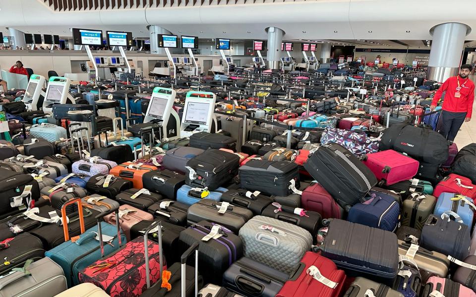 Luggage was left piling up amid the delays and cancellations