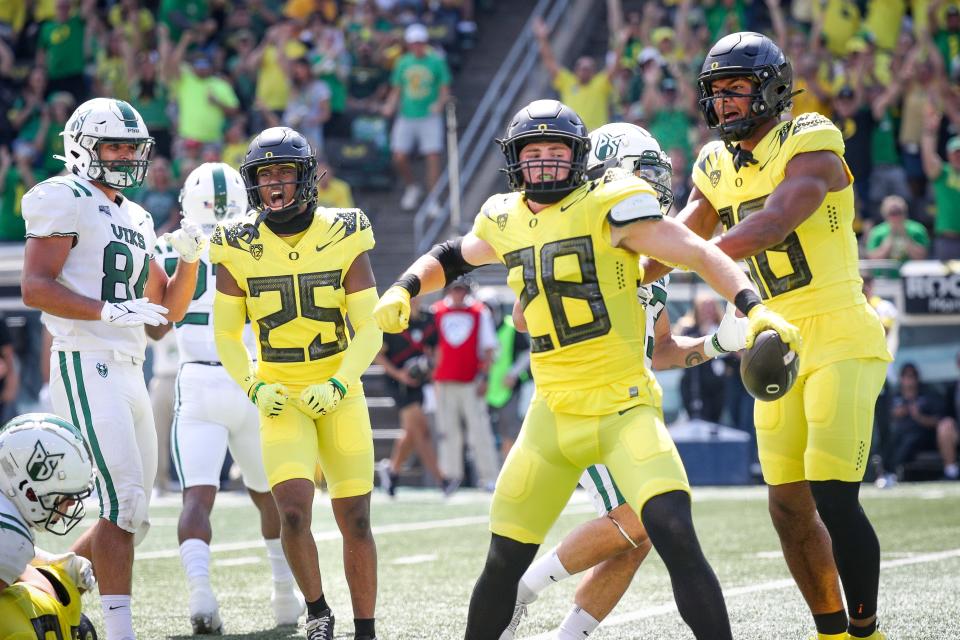 Oregon inside linebacker Bryce Boettcher and fellow members of the Oregon defense celebrate a fumbled punt return recovery as the Oregon Ducks host Portland State in the Ducks’ season opener Saturday, Sept. 2, 2023, at Autzen Stadium in Eugene, Ore.