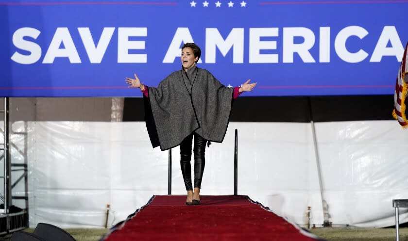 FILE - Arizona Republican candidate for governor Kari Lake acknowledges the crowd at a rally prior to her speaking before former President Donald Trump spoke on Jan. 15, 2022, in Florence, Ariz. A growing number of Republican candidates are claiming, or even previewing, that voter fraud is the only reason for their loss in a GOP primary. The latest to make the claim, which is ripped from former President Donald Trump's 2020 playbook, is Lake, the Trump-endorsed candidate in the Arizona Republican primary for governor. Critics say the claims, always presented without evidence, further undermine confidence in elections. (AP Photo/Ross D. Franklin, File)