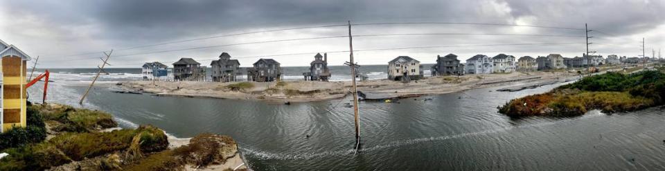 A panorama of the damage at the north end of Rodanthe, N.C.Tuesday, August 30, 2011 on Hatteras Island on the North Carolina Outer Banks from Hurricane Irene. The storm cut through the island at this point, washing out N.C. Highway 12. Remnants of the road can be seen at the upper right of the photograph. The panorama is made from seven photos combined.