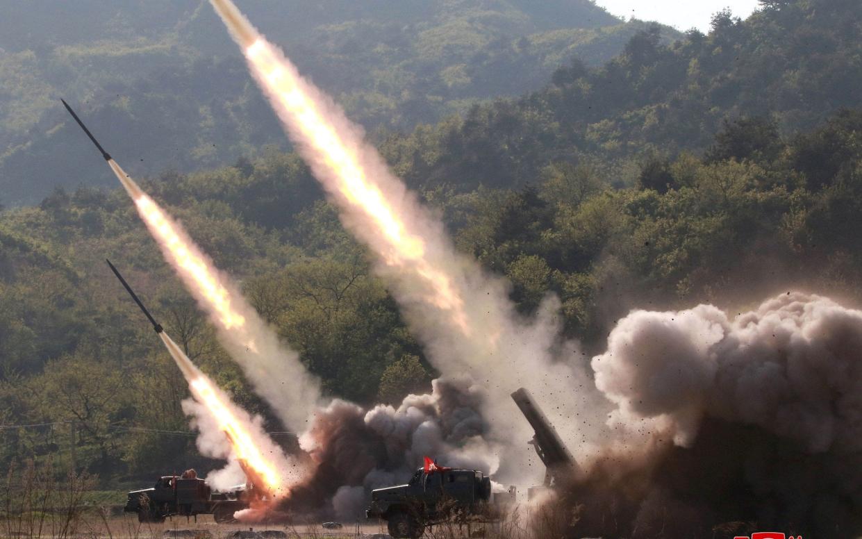 Missiles are seen launched during a military drill in North Korea in May 2019 - REUTERS