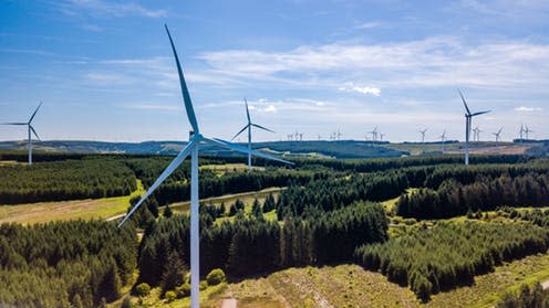   <span class="attribution"><a class="link " href="https://www.shutterstock.com/image-photo/aerial-drone-view-huge-wind-farm-1119701573" rel="nofollow noopener" target="_blank" data-ylk="slk:Richard Whitcombe/Shutterstock;elm:context_link;itc:0;sec:content-canvas">Richard Whitcombe/Shutterstock</a></span>