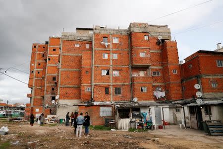 Residents speak with journalists at the Jamaican neighborhood in Seixal, Portugal January 22, 2019. REUTERS/Rafael Marchante