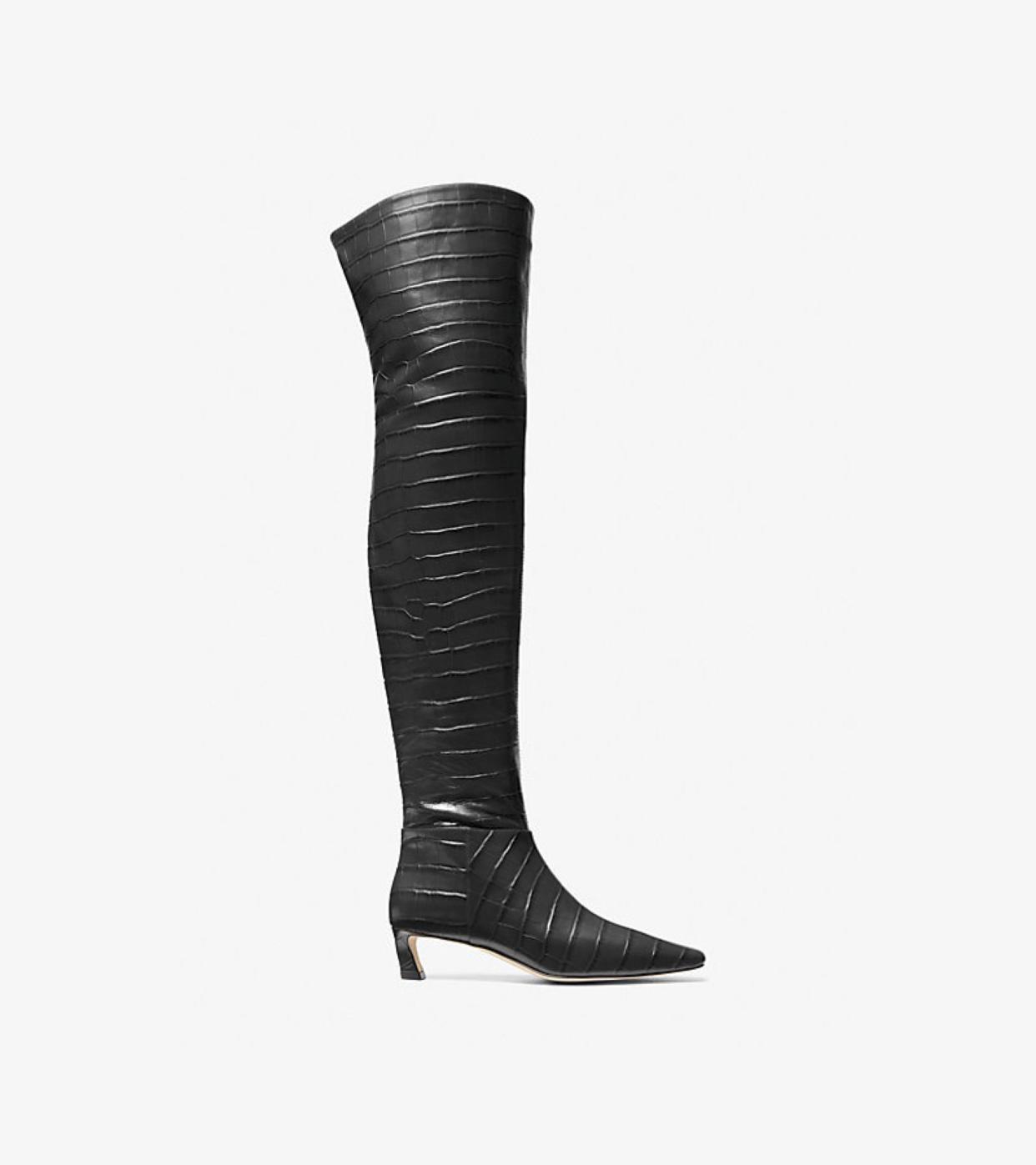 <p><a href="https://go.redirectingat.com?id=74968X1596630&url=https%3A%2F%2Fwww.michaelkors.com%2Fcosmo-crocodile-embossed-leather-boot%2F40F4CSMB5E.html&sref=https%3A%2F%2Fwww.townandcountrymag.com%2Fstyle%2Ffashion-trends%2Fa62350555%2Ffall-2024-shoe-trends%2F" data-i13n="elm:affiliate_link;elmt:premonetized" rel="sponsored" target="_blank" data-ylk="slk:Shop Now;elm:affiliate_link;elmt:premonetized;itc:0;sec:content-canvas" class="link rapid-noclick-resp rapid-with-clickid etailiffa-link">Shop Now</a></p> <p>Cosmo Boot</p> <p>Michael Kors</p> <p>$262.50</p>