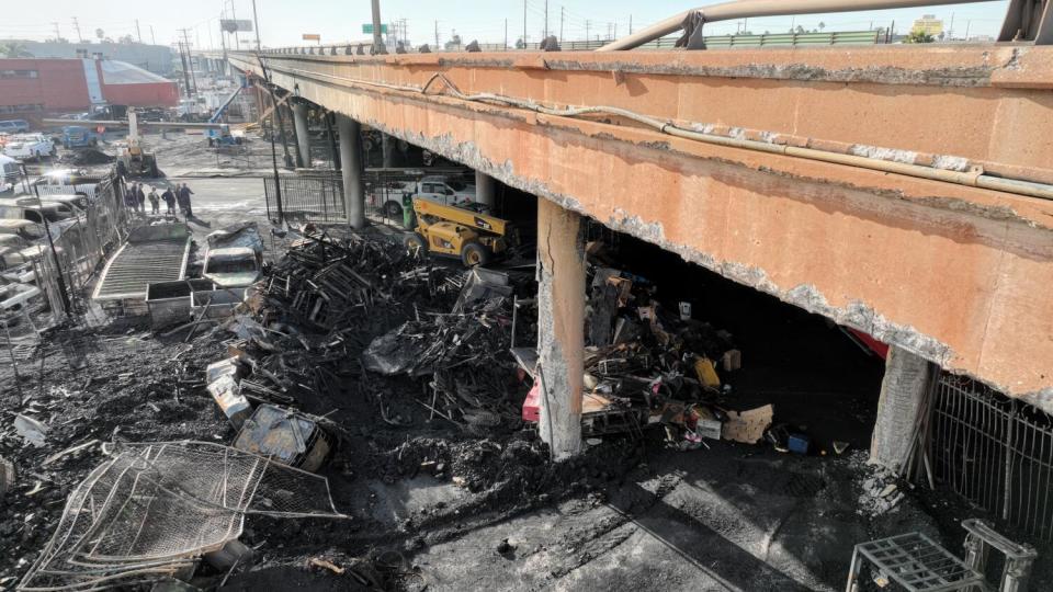 Aerial view of the 10 Freeway days after a large pallet fire.