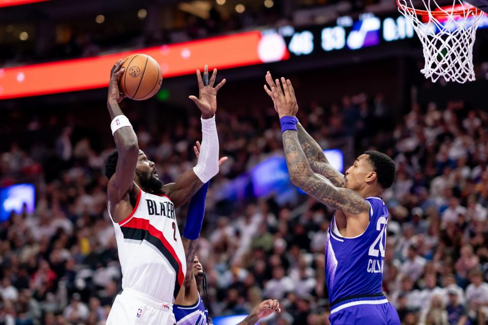 Portland Trail Blazers center <a class="link " href="https://sports.yahoo.com/nba/players/5958" data-i13n="sec:content-canvas;subsec:anchor_text;elm:context_link" data-ylk="slk:Deandre Ayton;sec:content-canvas;subsec:anchor_text;elm:context_link;itc:0">Deandre Ayton</a> (2) goes to the hoop against Utah Jazz forward John Collins (20) during the game at the Delta Center in Salt Lake City on Tuesday, Nov. 14, 2023. | Spenser Heaps, Deseret News