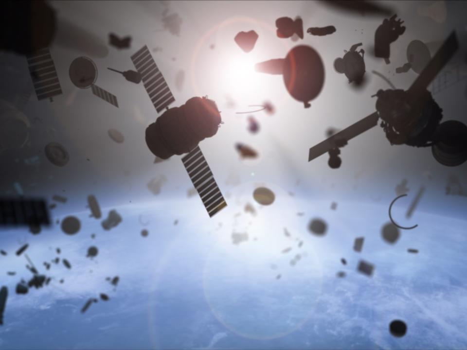 satellite crash collision space junk debris illustration shutterstock_276319031