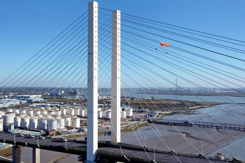 Just Stop Oil protesters on the Queen Elizabeth II Bridge, which links Kent and Essex. (PA)