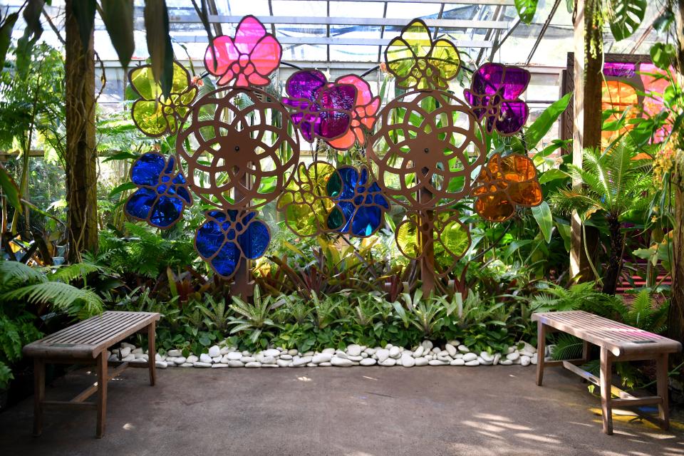 A color world in the Selby Gardens Tropical Conservatory creates the style of Tiffany leaded-glass windows for its exhibition “Tiffany: The Pursuit of Beauty in Nature.”