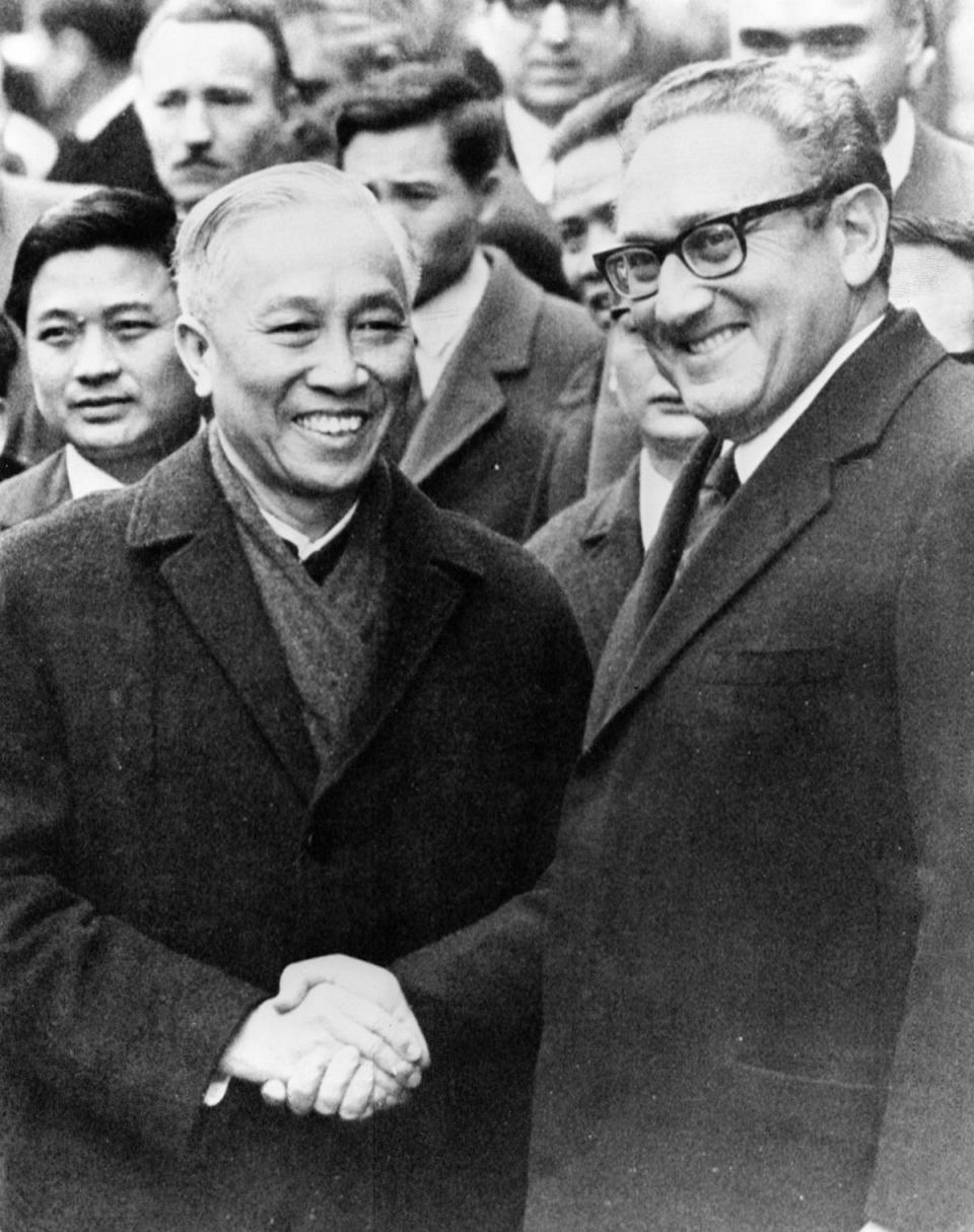 North Vietnamese politburo member Le Duc Tho with Kissinger during peace talks on the Vietnam War in Paris, France on 24 January 1973 (Getty)