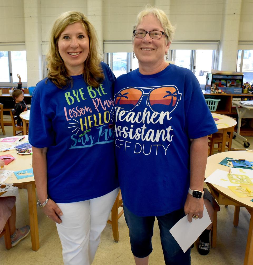 Ida Elementary kindergarten teacher Sherry Locke (left) and teaching assistant Carolyn Clark (right) wore these shirts on their last day of school. The duo is retiring after a decade in the same classroom together.