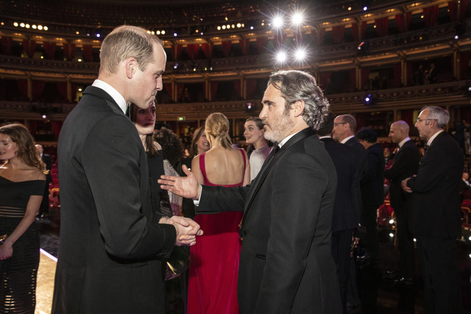William speaks with BAFTA winner Joaquin Phoenix.&nbsp; (Photo: WPA Pool via Getty Images)