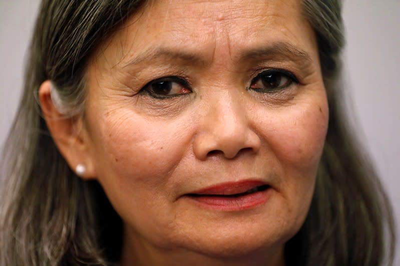 Mu Sochua, Deputy President of the Cambodia National Rescue Party (CNRP), reacts as she talks to journalists after a press conference in Jakarta