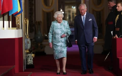 The Queen and Prince Charles arrive for the formal opening of the Commonwealth Heads of Government Meeting at Buckingham Palace - Credit:  Jonathan Brady